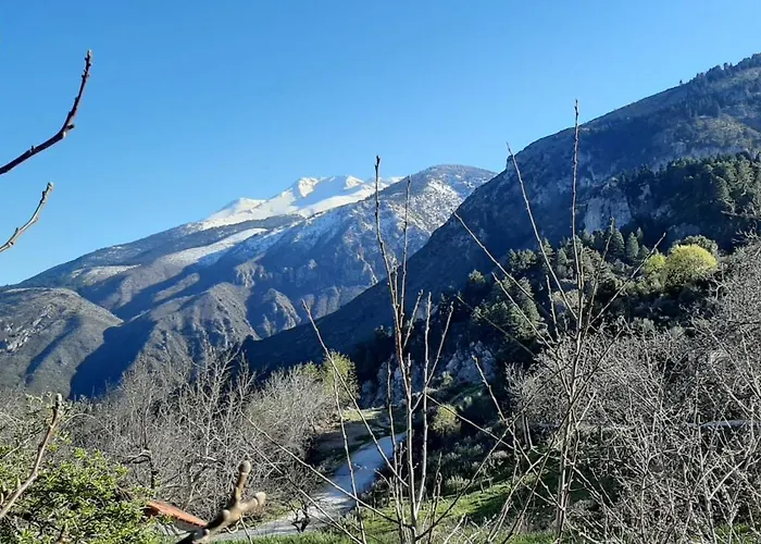 εν αρχή - En Arhi